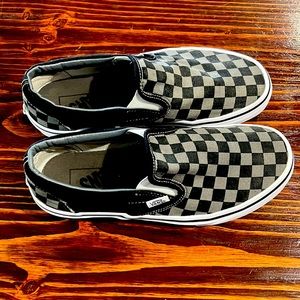 Vans black and gray checkered size 6.5 Mens and size 8 in Women. Good condition